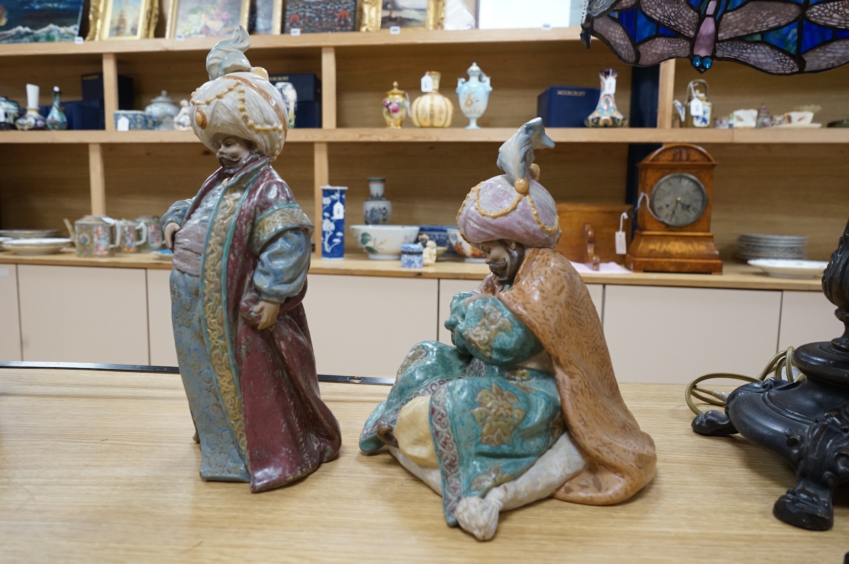 Two Lladro polychrome stoneware figures of ‘Sultans’.(2) tallest 40cm.